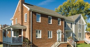 Doctor Bruner practiced out of the brick house, which was moved and restored, and is now part of a row of three townhouses.