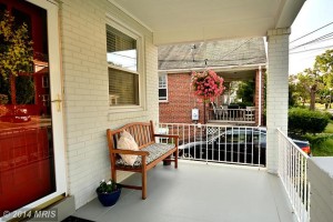 AR8434628 - Relax on your charming front porch.